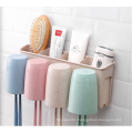 Bathroom non-perforated wheat straw toothbrush holder with toothpaste squeezer